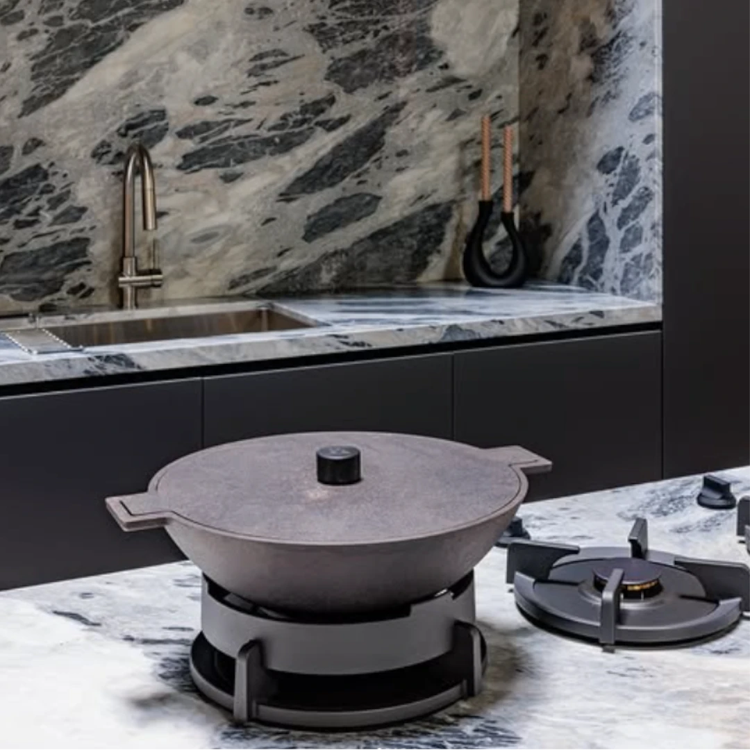 San Diego HQ Showroom Kitchen. Striking stone surfaces meet refined minimalism for a kitchen built around form and function. Photography: Eugenio Iglesias