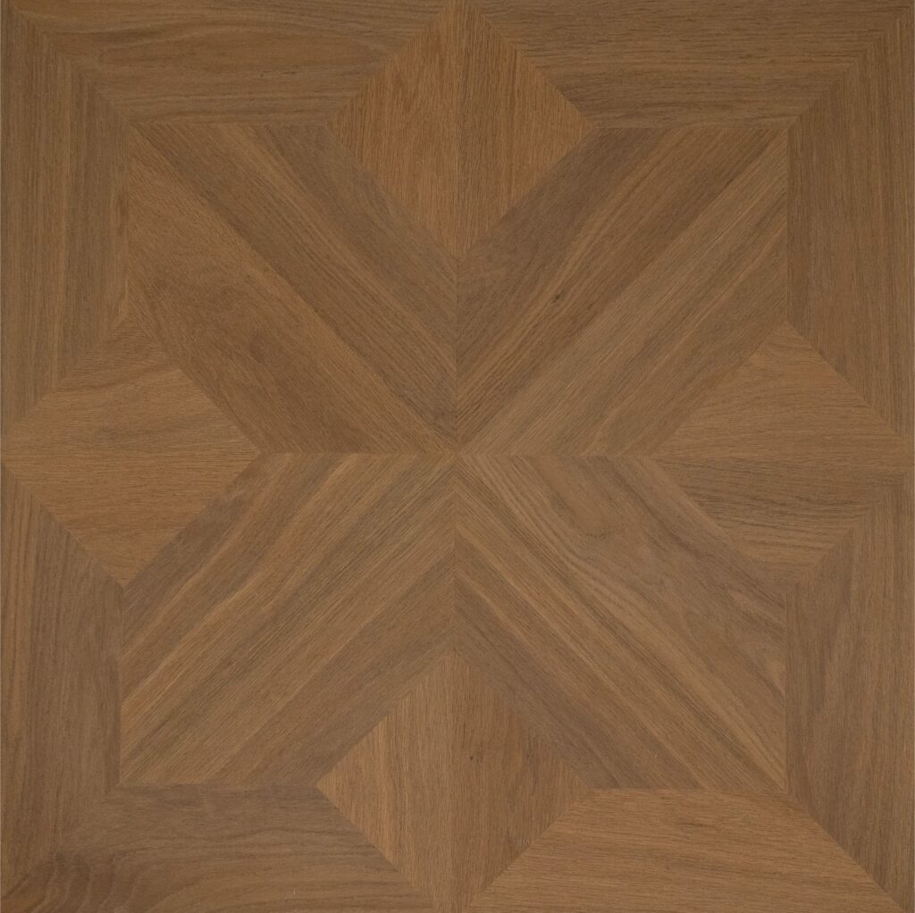 Geometric parquet wood flooring pattern in warm medium brown tones with visible natural wood grain.