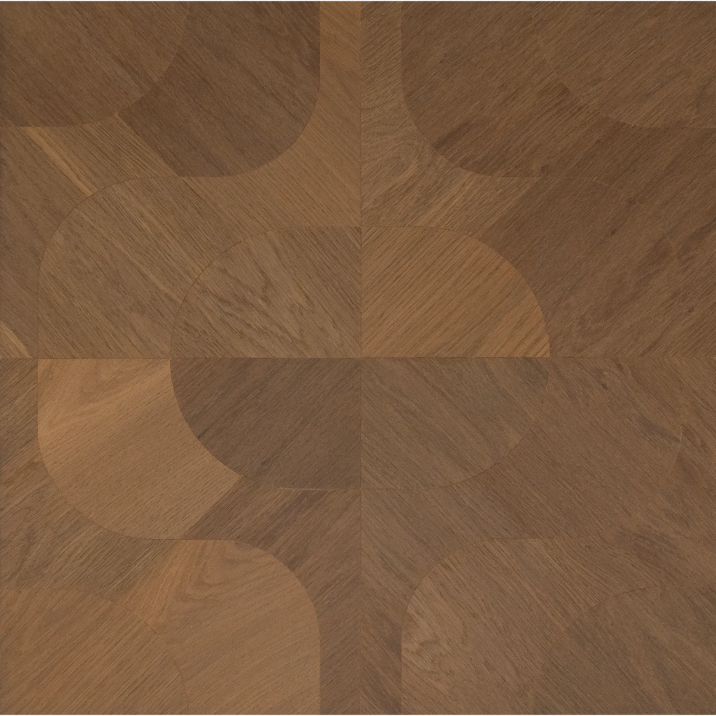 A close-up of a brown wood flooring sample with a geometric pattern of interlocking arches and quarter-circle shapes in varying wood grain tones.